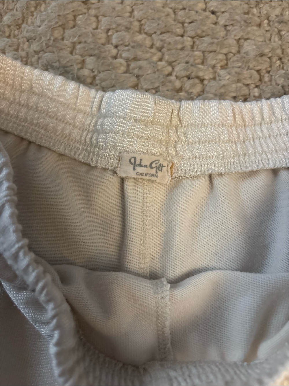 Brandy Melville White Athletic Shorts with Navy Trim and Flag Patch - Picture 3 of 4